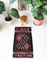 Vintage kilim rug in living room setting, bright colors, wild shaman, soft rug, bold color, Portland, Oregon, rug store, rug shop, local shop, vintage rug, modern kilim, warm colors