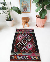 Vintage kilim rug in living room setting, bright colors, wild shaman, soft rug, bold color, Portland, Oregon, rug store, rug shop, local shop, vintage rug, modern kilim, warm colors