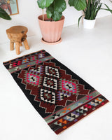 Vintage kilim rug in living room setting, bright colors, wild shaman, soft rug, bold color, Portland, Oregon, rug store, rug shop, local shop, vintage rug, modern kilim, warm colors
