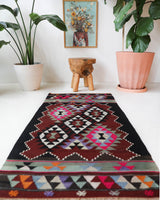 Vintage kilim rug in living room setting, bright colors, wild shaman, soft rug, bold color, Portland, Oregon, rug store, rug shop, local shop, vintage rug, modern kilim, warm colors