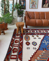 Vintage Turkish rug in a living room setting, Area rug in a living room setting, pile rug, Turkish rug, custom rug, , new rug, modern rug, customizable rug, made to order rug, portland, rug shop, bright colors, wild shaman, soft rug, bold color, Portland, Oregon, rug store, rug shop, local shop, made in Turkey