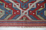 Vintage kilim rug in room decor setting, old rug, antique rug, pastel colors, faded colors, Turkish rug, vintage rug, soft rug, Portland, Oregon, rug store, rug shop, local shop,  antique kilim rug, bold colors, bright colors, faded colors