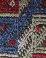 Vintage kilim rug in room decor setting, old rug, antique rug, pastel colors, faded colors, Turkish rug, vintage rug, soft rug, Portland, Oregon, rug store, rug shop, local shop,  antique kilim rug, bold colors, bright colors, faded colors