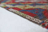 Vintage kilim rug in room decor setting, old rug, antique rug, pastel colors, faded colors, Turkish rug, vintage rug, soft rug, Portland, Oregon, rug store, rug shop, local shop,  antique kilim rug, bold colors, bright colors, faded colors