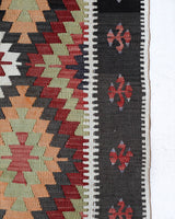 Vintage kilim rug in room decor setting, old rug, antique rug, pastel colors, faded colors, Turkish rug, vintage rug, soft rug, Portland, Oregon, rug store, rug shop, local shop, antique kilim rug, bold colors, bright colors, faded colors