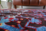 Vintage Turkish rug in a living room setting, Area rug in a living room setting, pile rug, Turkish rug, modern rug, customizable rug, portland, rug shop, bright colors, wild shaman, soft rug, bold color, Portland, Oregon, rug store, rug shop, local shop, made in Turkey
