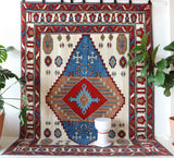 Vintage Turkish rug in a living room setting, Area rug in a living room setting, pile rug, Turkish rug, custom rug, , new rug, modern rug, customizable rug, made to order rug, portland, rug shop, bright colors, wild shaman, soft rug, bold color, Portland, Oregon, rug store, rug shop, local shop, made in Turkey