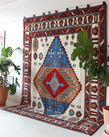 Vintage Turkish rug in a living room setting, Area rug in a living room setting, pile rug, Turkish rug, custom rug, , new rug, modern rug, customizable rug, made to order rug, portland, rug shop, bright colors, wild shaman, soft rug, bold color, Portland, Oregon, rug store, rug shop, local shop, made in Turkey
