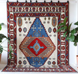 Vintage Turkish rug in a living room setting, Area rug in a living room setting, pile rug, Turkish rug, custom rug, , new rug, modern rug, customizable rug, made to order rug, portland, rug shop, bright colors, wild shaman, soft rug, bold color, Portland, Oregon, rug store, rug shop, local shop, made in Turkey