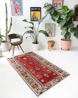 Vintage kilim rug in room decor setting, old rug, antique rug, pastel colors, faded colors, Turkish rug, vintage rug, soft rug, Portland, Oregon, rug store, rug shop, local shop, antique kilim rug, bold colors, bright colors, faded colors