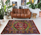 Vintage Turkish rug in a living room setting, Area rug in a living room setting, pile rug, Turkish rug, modern rug, customizable rug, portland, rug shop, bright colors, wild shaman, soft rug, bold color, Portland, Oregon, rug store, rug shop, local shop, made in Turkey