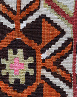 Vintage kilim rug in room decor setting, old rug, antique rug, pastel colors, faded colors, Turkish rug, vintage rug, soft rug, Portland, Oregon, rug store, rug shop, local shop, antique kilim rug, bold colors, bright colors, faded colors