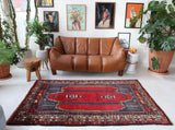 Vintage Turkish rug in a living room setting, pile rug, Turkish rug, vintage rug, portland, rug shop, bright colors, wild shaman, soft rug, bold color, Portland, Oregon, rug store, rug shop, local shop, antique rug