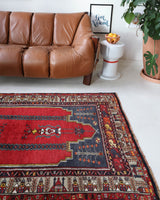 Vintage Turkish rug in a living room setting, pile rug, Turkish rug, vintage rug, portland, rug shop, bright colors, wild shaman, soft rug, bold color, Portland, Oregon, rug store, rug shop, local shop, antique rug