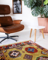 Vintage Turkish runner rug in a living room setting, pile rug, Turkish rug, vintage rug, portland, rug shop, bright colors, wild shaman, soft rug, bold color, Portland, Oregon, rug store, rug shop, local shop, antique rug