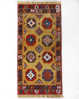 Vintage Turkish runner rug in a living room setting, pile rug, Turkish rug, vintage rug, portland, rug shop, bright colors, wild shaman, soft rug, bold color, Portland, Oregon, rug store, rug shop, local shop, antique rug