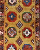 Vintage Turkish runner rug in a living room setting, pile rug, Turkish rug, vintage rug, portland, rug shop, bright colors, wild shaman, soft rug, bold color, Portland, Oregon, rug store, rug shop, local shop, antique rug