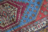 Vintage Turkish rug in living room setting, old rug, antique rug, pastel colors, faded colors, Turkish rug, vintage rug, soft rug, Portland, Oregon, rug store, rug shop, local shop