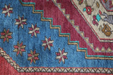 Vintage Turkish rug in living room setting, old rug, antique rug, pastel colors, faded colors, Turkish rug, vintage rug, soft rug, Portland, Oregon, rug store, rug shop, local shop