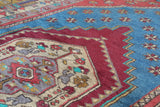 Vintage Turkish rug in living room setting, old rug, antique rug, pastel colors, faded colors, Turkish rug, vintage rug, soft rug, Portland, Oregon, rug store, rug shop, local shop