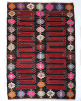 Vintage kilim rug in living room setting, bright colors, wild shaman, soft rug, bold color, Portland, Oregon, rug store, rug shop, local shop, vintage rug, modern kilim, warm colors, antique kilim rug