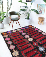 Vintage kilim rug in living room setting, bright colors, wild shaman, soft rug, bold color, Portland, Oregon, rug store, rug shop, local shop, vintage rug, modern kilim, warm colors, antique kilim rug