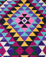 Vintage kilim rug in living room setting, bright colors, wild shaman, soft rug, bold color, Portland, Oregon, rug store, rug shop, local shop, vintage rug, modern kilim, warm colors, antique kilim rug