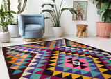 Vintage kilim rug in living room setting, bright colors, wild shaman, soft rug, bold color, Portland, Oregon, rug store, rug shop, local shop, vintage rug, modern kilim, warm colors, antique kilim rug