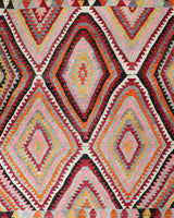 Vintage kilim rug in room decor setting, old rug, antique rug, pastel colors, faded colors, Turkish rug, vintage rug, soft rug, Portland, Oregon, rug store, rug shop, local shop, antique kilim rug, bold colors, bright colors, faded colors
