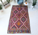 Vintage kilim rug in living room setting, bright colors, wild shaman, soft rug, bold color, Portland, Oregon, rug store, rug shop, local shop, vintage rug, modern kilim, warm colors