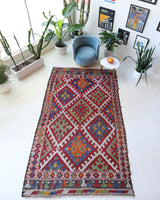 Vintage kilim rug in living room setting, bright colors, wild shaman, soft rug, bold color, Portland, Oregon, rug store, rug shop, local shop, vintage rug, modern kilim, warm colors