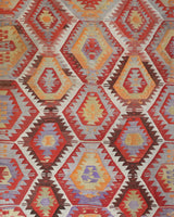 Vintage kilim rug in room decor setting, old rug, antique rug, pastel colors, faded colors, Turkish rug, vintage rug, soft rug, Portland, Oregon, rug store, rug shop, local shop, antique kilim rug, bold colors, bright colors, faded colors