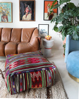 Floor pouf in a living room setting, pillow, turkish pillow, kilim pillow, home decor, decorative pillow, sham, rug pillow, decor, home decor, pouf, floor cushion, cushion, Portland, rugshop, Oregon, Wild Shaman, ottoman