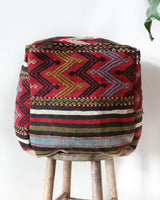 Floor pouf in a living room setting, pillow, turkish pillow, kilim pillow, home decor, decorative pillow, sham, rug pillow, decor, home decor, pouf, floor cushion, cushion, Portland, rugshop, Oregon, Wild Shaman, ottoman