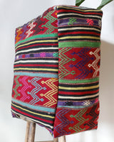 Floor pouf in a living room setting, pillow, turkish pillow, kilim pillow, home decor, decorative pillow, sham, rug pillow, decor, home decor, pouf, floor cushion, cushion, Portland, rugshop, Oregon, Wild Shaman, ottoman