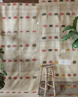 Vintage kilim rug in living room setting, old rug, antique rug, pastel colors, faded colors, Turkish rug, vintage rug, soft rug, Portland, Oregon, rug store, rug shop, local shop, earthy tones, earthy colors, warm colors