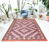 Vintage kilim rug in room decor setting, old rug, antique rug, pastel colors, faded colors, Turkish rug, vintage rug, soft rug, Portland, Oregon, rug store, rug shop, local shop, antique kilim rug, bold colors, bright colors, faded colors