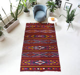 Vintage kilim rug in living room setting, bright colors, wild shaman, soft rug, bold color, Portland, Oregon, rug store, rug shop, local shop, vintage rug, modern kilim, warm colors