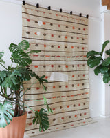 Vintage kilim rug in living room setting, old rug, antique rug, pastel colors, faded colors, Turkish rug, vintage rug, soft rug, Portland, Oregon, rug store, rug shop, local shop, earthy tones, earthy colors, warm colors