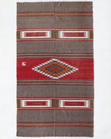 Vintage kilim rug in living room setting, old rug, antique rug, pastel colors, faded colors, Turkish rug, vintage rug, soft rug, Portland, Oregon, rug store, rug shop, local shop, earthy tones, earthy colors, warm colors