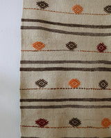 Vintage kilim rug in living room setting, old rug, antique rug, pastel colors, faded colors, Turkish rug, vintage rug, soft rug, Portland, Oregon, rug store, rug shop, local shop, earthy tones, earthy colors, warm colors