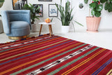 Vintage kilim rug in living room setting, bright colors, wild shaman, soft rug, bold color, Portland, Oregon, rug store, rug shop, local shop, vintage rug, modern kilim, warm colors