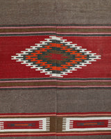 Vintage kilim rug in living room setting, old rug, antique rug, pastel colors, faded colors, Turkish rug, vintage rug, soft rug, Portland, Oregon, rug store, rug shop, local shop, earthy tones, earthy colors, warm colors