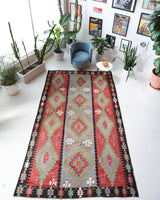 Vintage kilim rug in living room setting, bright colors, wild shaman, soft rug, bold color, Portland, Oregon, rug store, rug shop, local shop, vintage rug, modern kilim, warm colors
