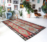 Vintage kilim rug in living room setting, bright colors, wild shaman, soft rug, bold color, Portland, Oregon, rug store, rug shop, local shop, vintage rug, modern kilim, warm colors