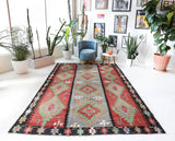 Vintage kilim rug in living room setting, bright colors, wild shaman, soft rug, bold color, Portland, Oregon, rug store, rug shop, local shop, vintage rug, modern kilim, warm colors