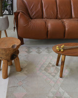 Vintage kilim rug in living room setting, old rug, antique rug, pastel colors, faded colors, Turkish rug, vintage rug, soft rug, Portland, Oregon, rug store, rug shop, local shop, earthy tones, earthy colors, warm colors