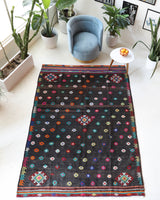 Vintage kilim rug in living room setting, bright colors, wild shaman, soft rug, bold color, Portland, Oregon, rug store, rug shop, local shop, vintage rug, modern kilim, warm colors