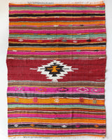 Vintage kilim rug in living room setting, bright colors, wild shaman, soft rug, bold color, Portland, Oregon, rug store, rug shop, local shop, vintage rug, modern kilim, warm colors