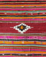 Vintage kilim rug in living room setting, bright colors, wild shaman, soft rug, bold color, Portland, Oregon, rug store, rug shop, local shop, vintage rug, modern kilim, warm colors